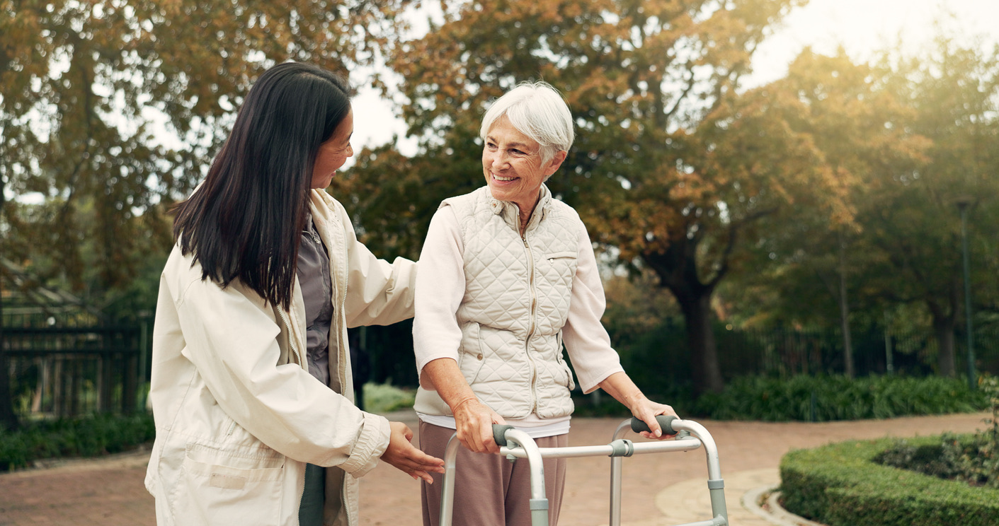 Caregiver walking with Resident